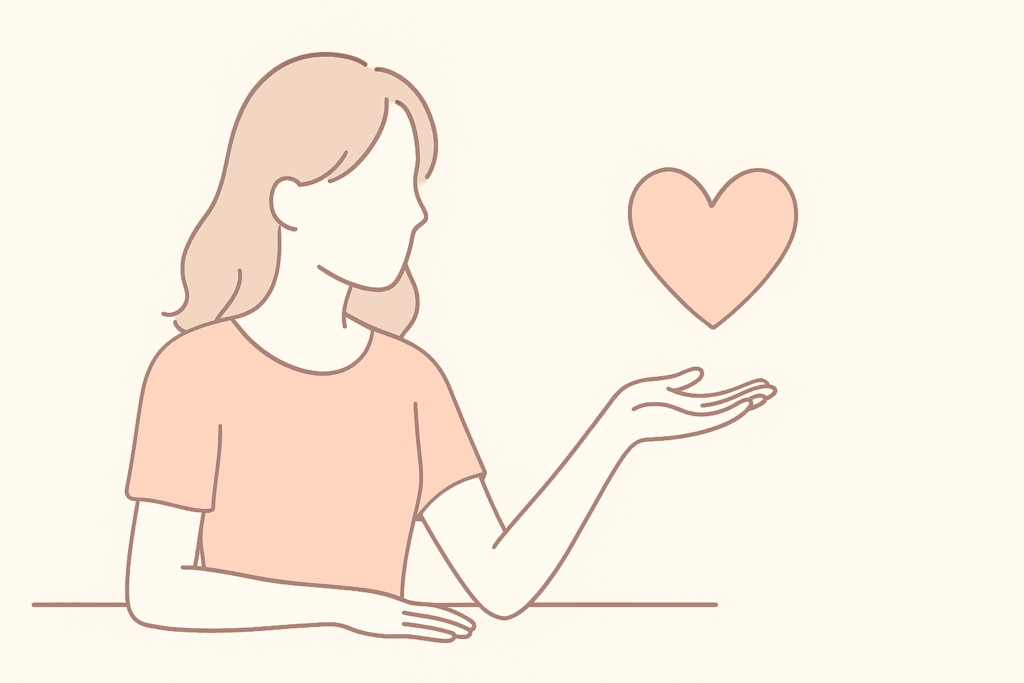 ハートを手に乗せている女性